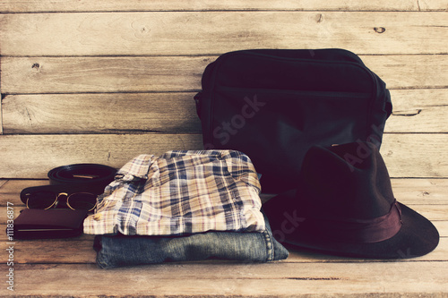 Vintage,Plaid shirt,Wallet,sunglasses,Hat,Belt,bag,Jean on wood