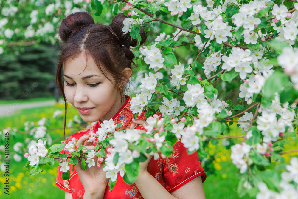 Beautiful asian girl in traditional chinese red dress. Beautiful asian girl in traditional chinese red dress.