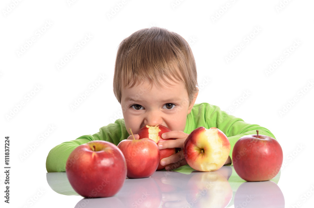 Cute child with red apples on white background Cute child with red apples on white background