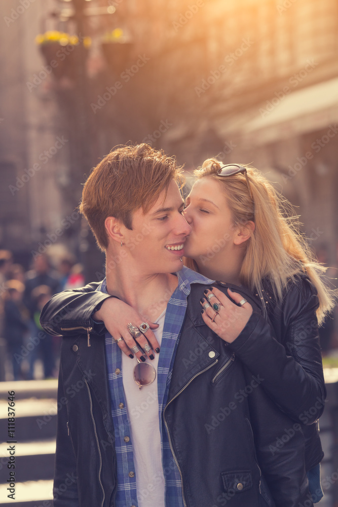 Young and good-looking urban couple enjoying outdoors. Young and good-looking urban couple enjoying outdoors.