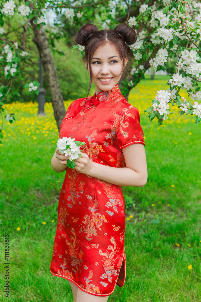 Beautiful asian girl in traditional chinese red dress. Beautiful asian girl in traditional chinese red dress.