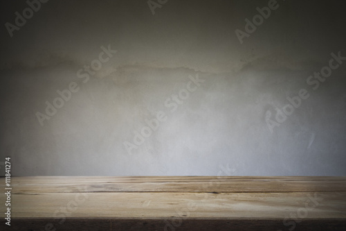 Wooden table or floor platform and polished concrete surface bac