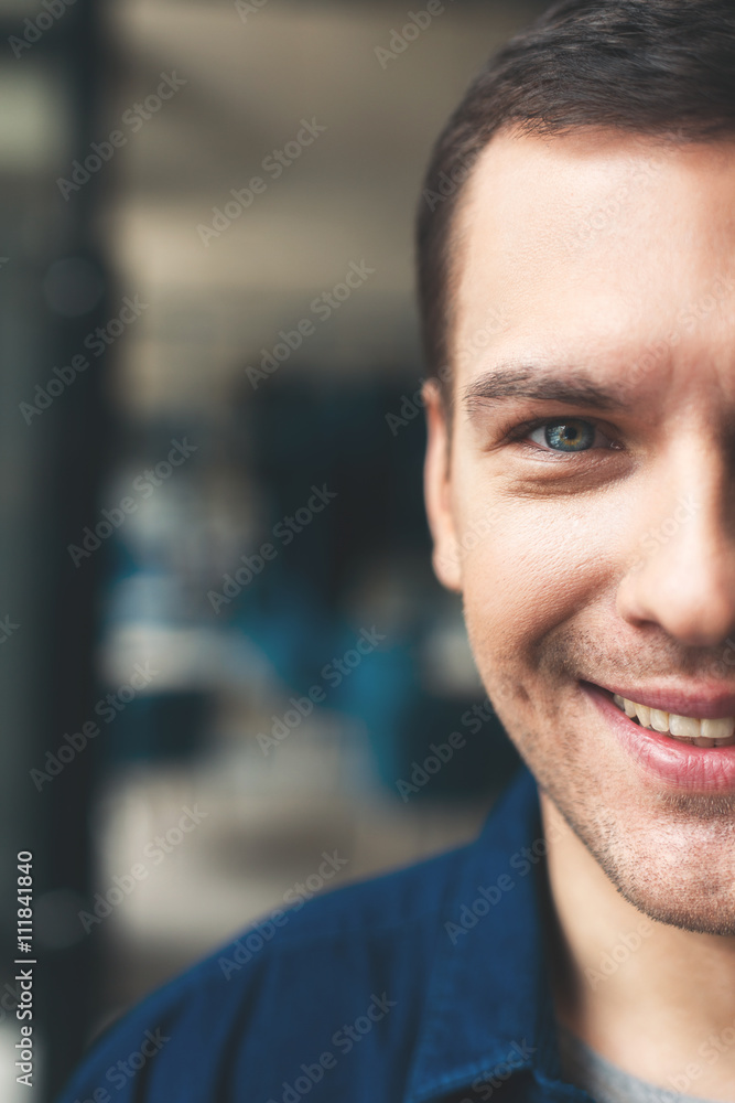 Handsome young guy is evincing his positivity Handsome young guy is evincing his positivity