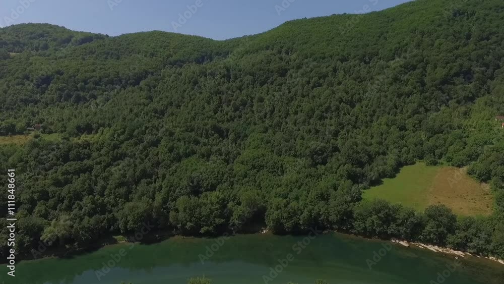 Aerial view of the river Drina Serbia. Low flight over the forest river..Aerial view of the water and woods Aerial view of the river Drina Serbia. Low flight over the forest river..Aerial view of the water and woods