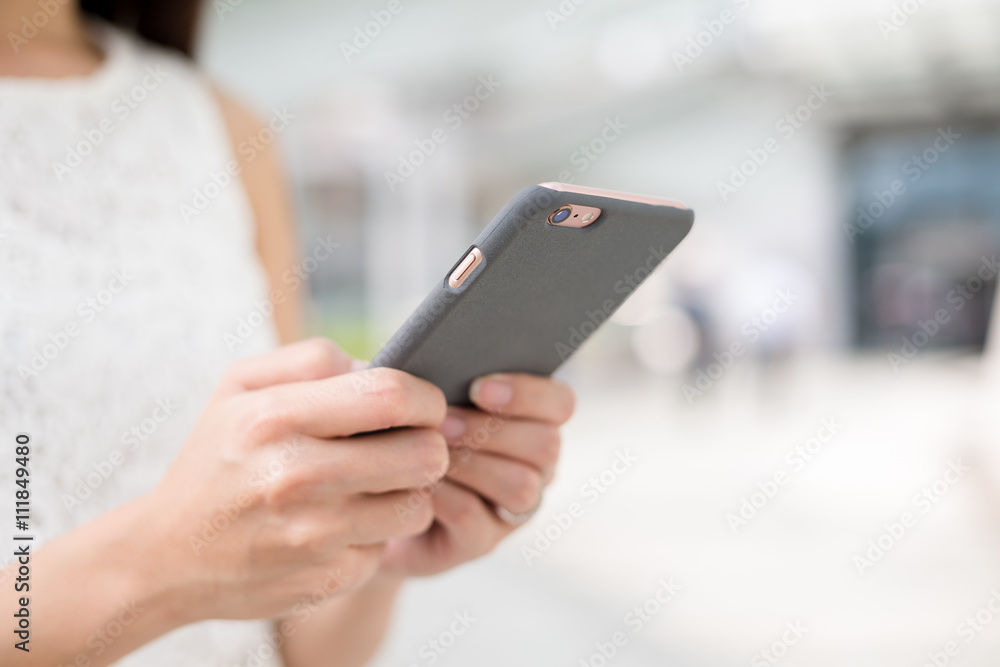 Woman using mobile phone