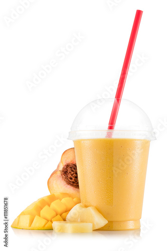 Yellow smoothie with mango, pineapple and peach