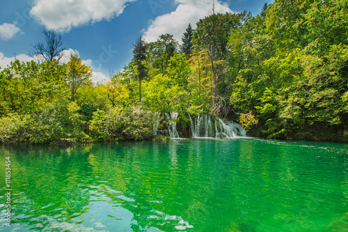     Beautiful landscape  waterfall and clear green water in the Plitvice Lakes National Park in Croatia 