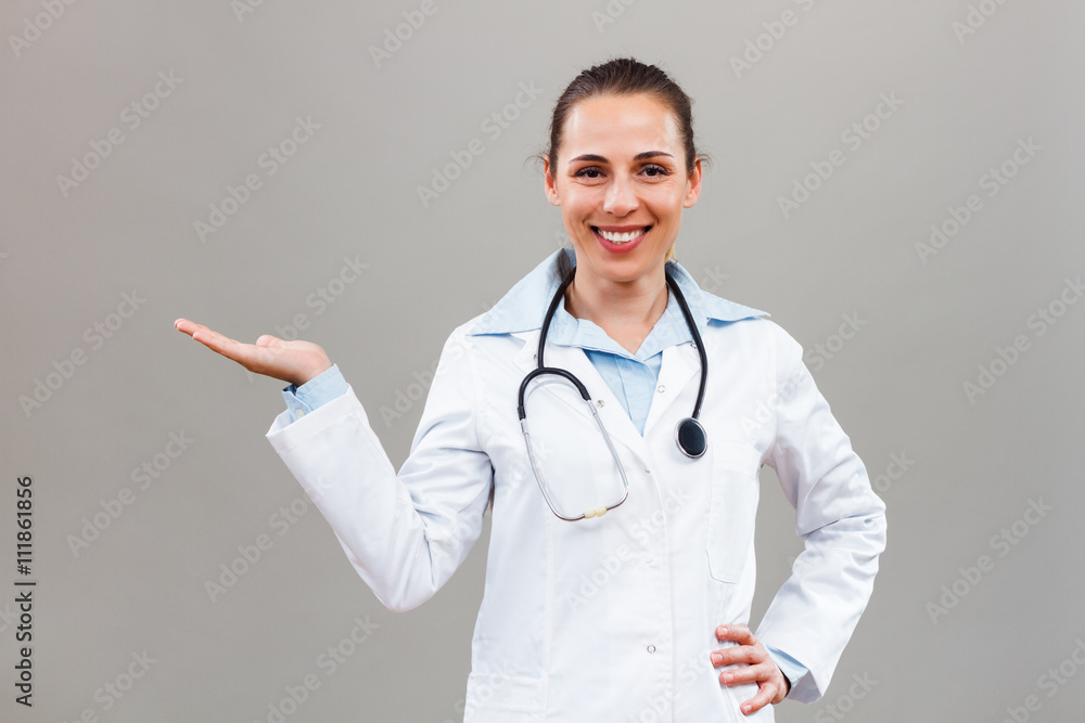 Beautiful female doctor gesturing Beautiful female doctor gesturing