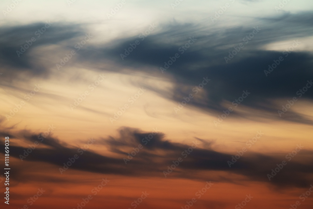 dask sunset sky with clouds, orange color
