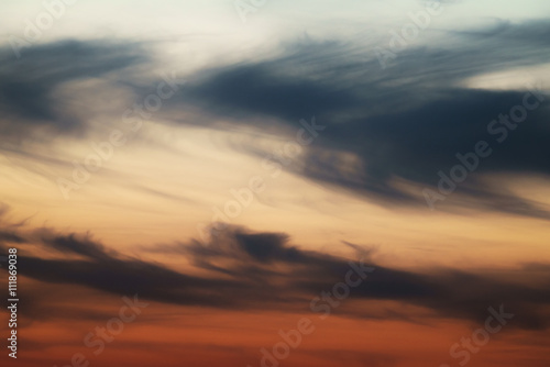 dask sunset sky with clouds, orange color