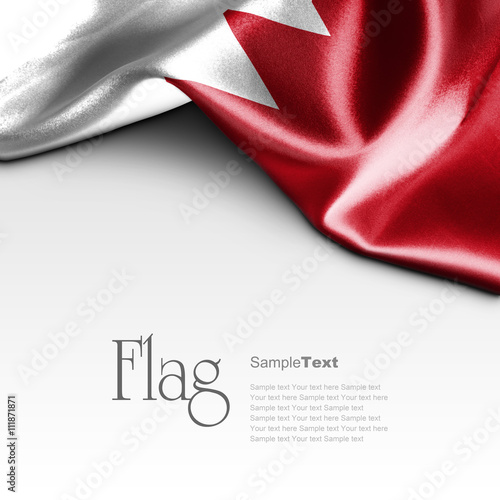 Flag of Bahrain on white background. Sample text. photo