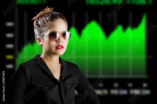 serious face business woman with business growth graph background