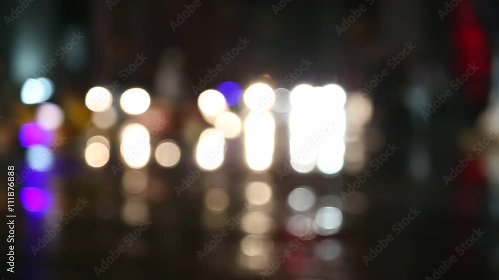 Defocused night traffic lights on a Rainy Day in Samutprakarn,Thailand with Rain Reflection
Defocused night traffic lights on a Rainy Day in Samutprakarn,Thailand with Rain Reflection