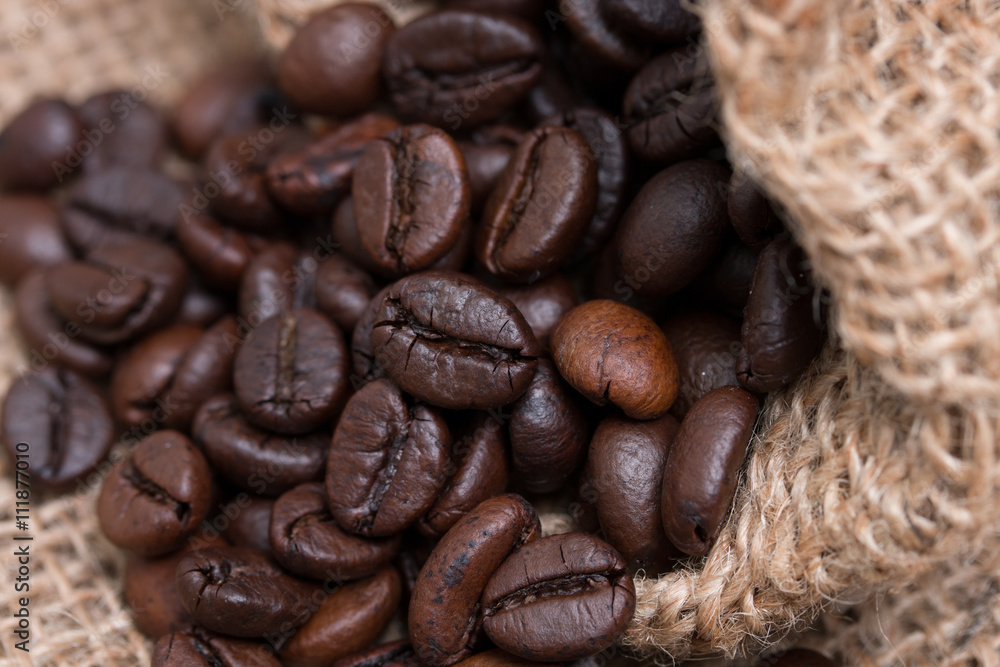 Naklejka premium coffee beans in coffee bag
