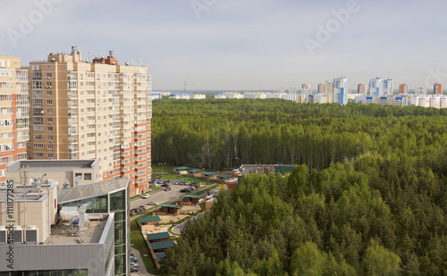 New high-rise buildings in a forested area of the city of Chelyabinsk.Russia.The view from the top.