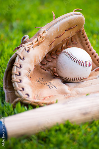 Baseball & Glove on Baseball Field