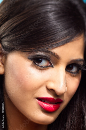 close-up shot of a attractive young female with make up on.