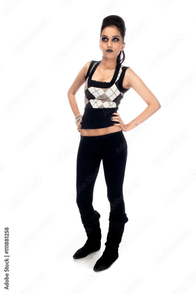 indian female fashion model looking away with hand on hips. indian female fashion model looking away with hand on hips.