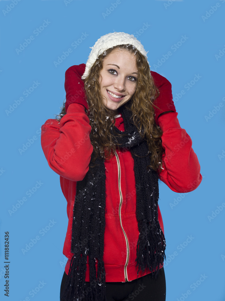 portrait of a attractive young female wearing a winter skull cap. portrait of a attractive young female wearing a winter skull cap.