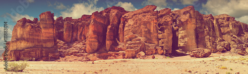 Geological formations (pillars of Solomon) in nature desert valley of Timna park, Israel. Image toned for inspiration of retro style  photo