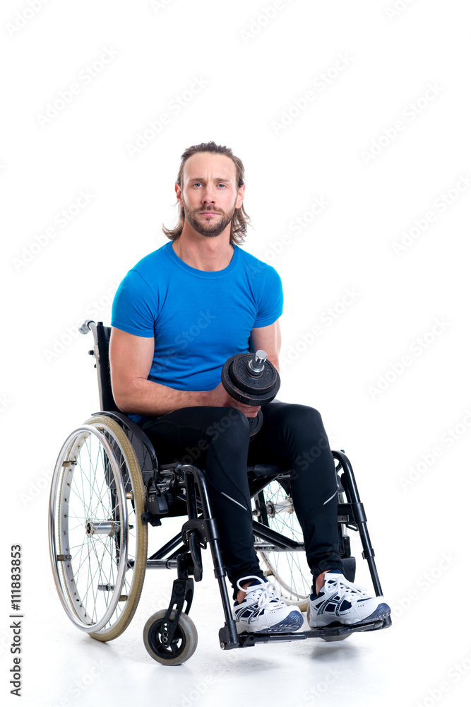 disabled man in wheelchair train with bar-bell disabled man in wheelchair train with bar-bell