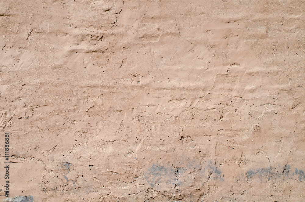 Fototapeta premium Texture of old rustic wall covered with brown stucco, background, texture series