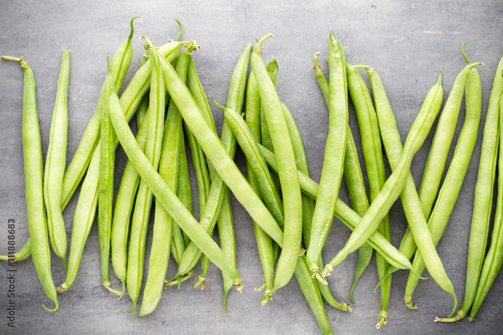 Green beans on a gray background. Green beans on a gray background.