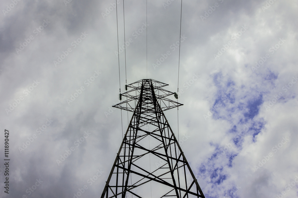 Pylon and transmission power line in cloudy day Pylon and transmission power line in cloudy day