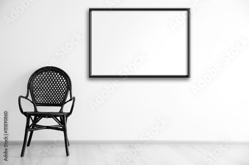 Black chair and empty pictu...