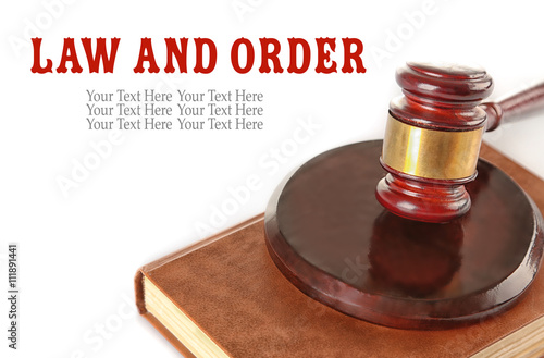 Gavel and book isolated on white. Law and order concept