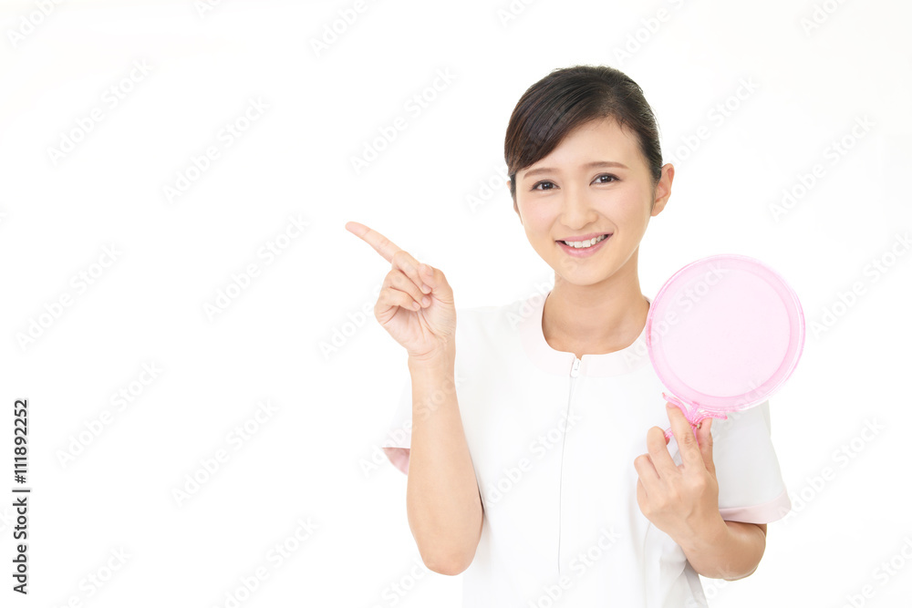 笑顔のエステティシャン