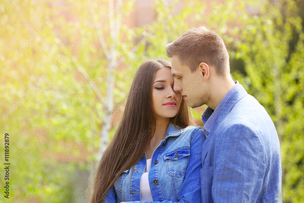 Young loving couple in spring park Young loving couple in spring park