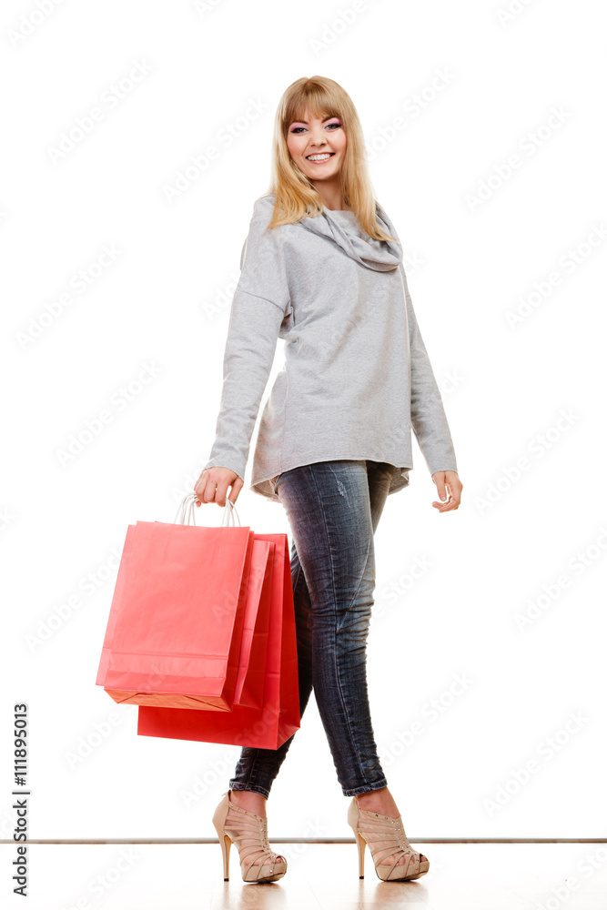 girl in full length with red shopping bags isolated girl in full length with red shopping bags isolated