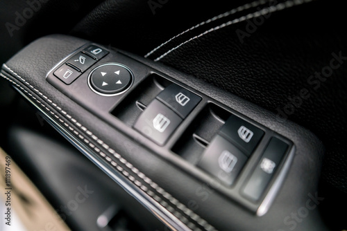 luxury car control buttons - door panel ; Interior details. 