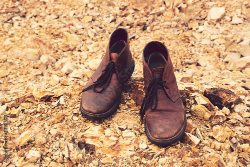 Vintage tone: Leather Shoe on Orange rocks