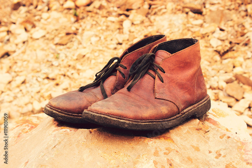 Vintage tone: Leather Shoe on Orange rocks