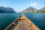 Old wooden Boat heading to island in Thailand