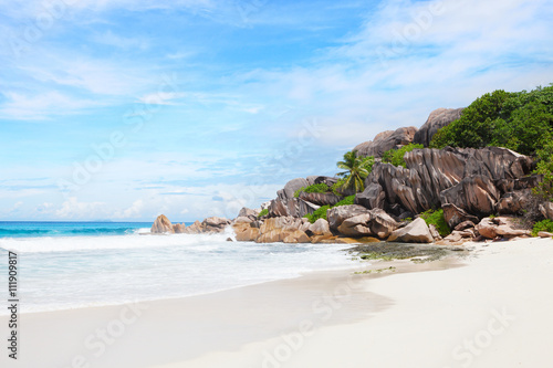 Beautiful tropical sand beach with granite rocks. Beach Grand Anse, La Digue, Seychelles.