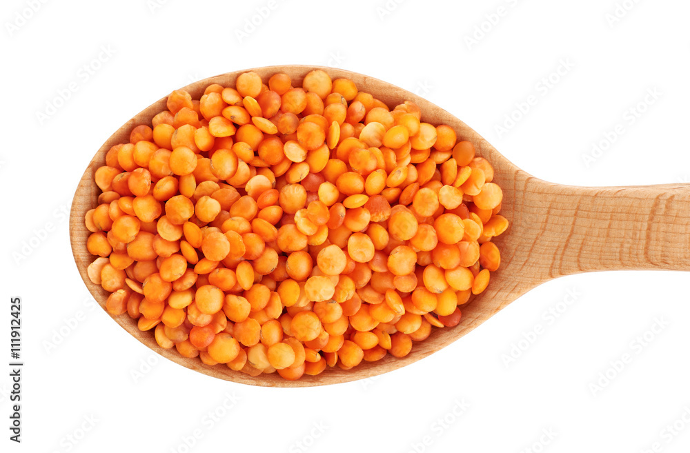 Wooden spoon with lentils isolated on white background. Wooden spoon with lentils isolated on white background.