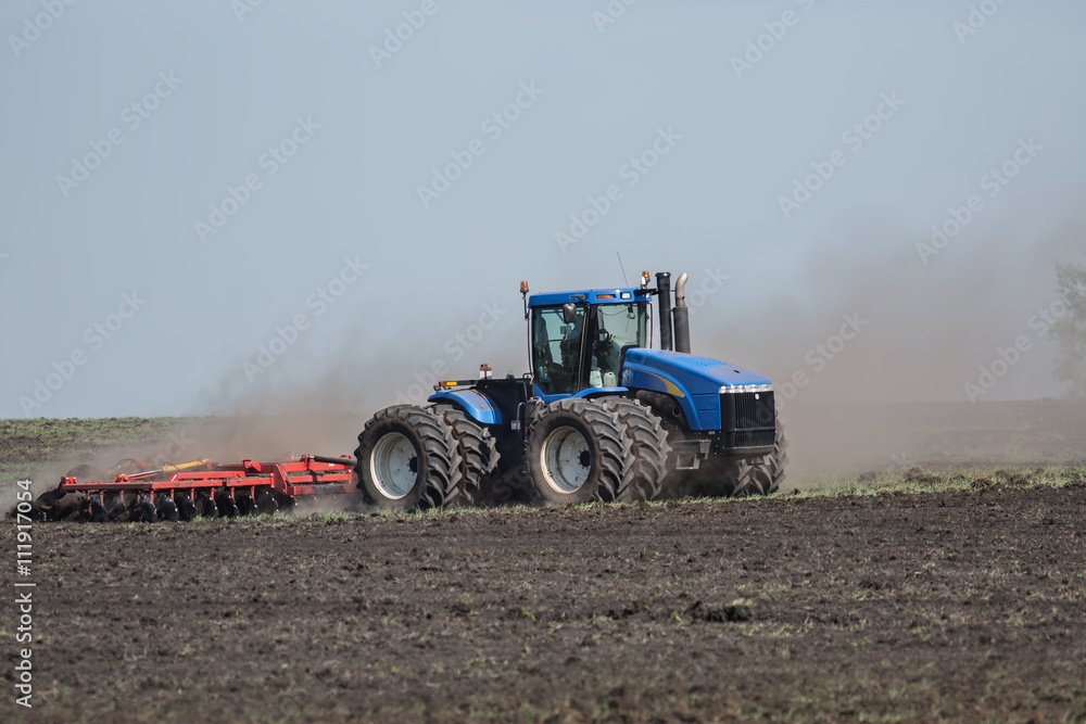 Fototapeta premium Tractor with plow