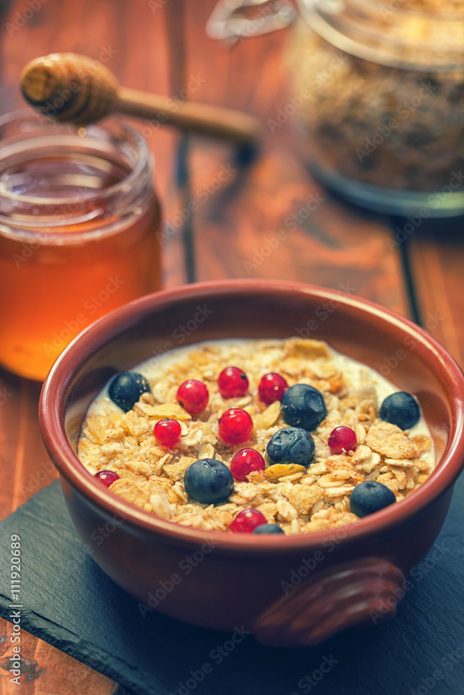 Healthy Breakfast Muesli with berries,honey and milk Healthy Breakfast Muesli with berries,honey and milk