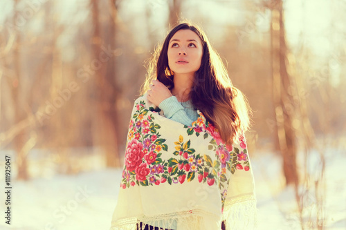 beautiful model in a traditional Russian scarf winter photo