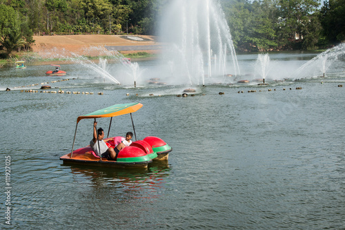 Photography father and play water bike boat