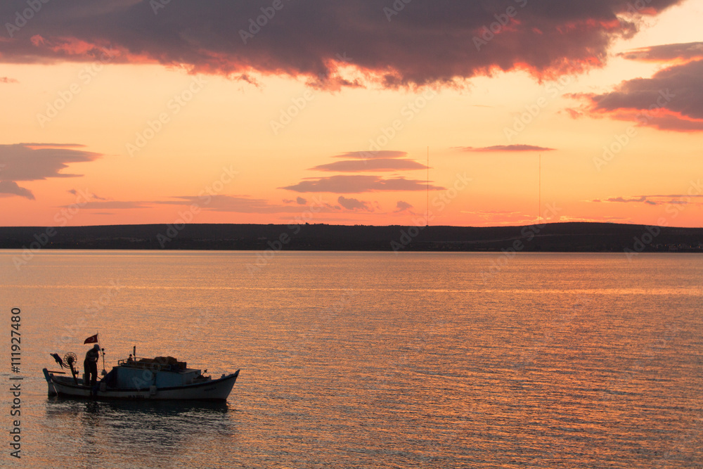 Sunset & fishing boat
