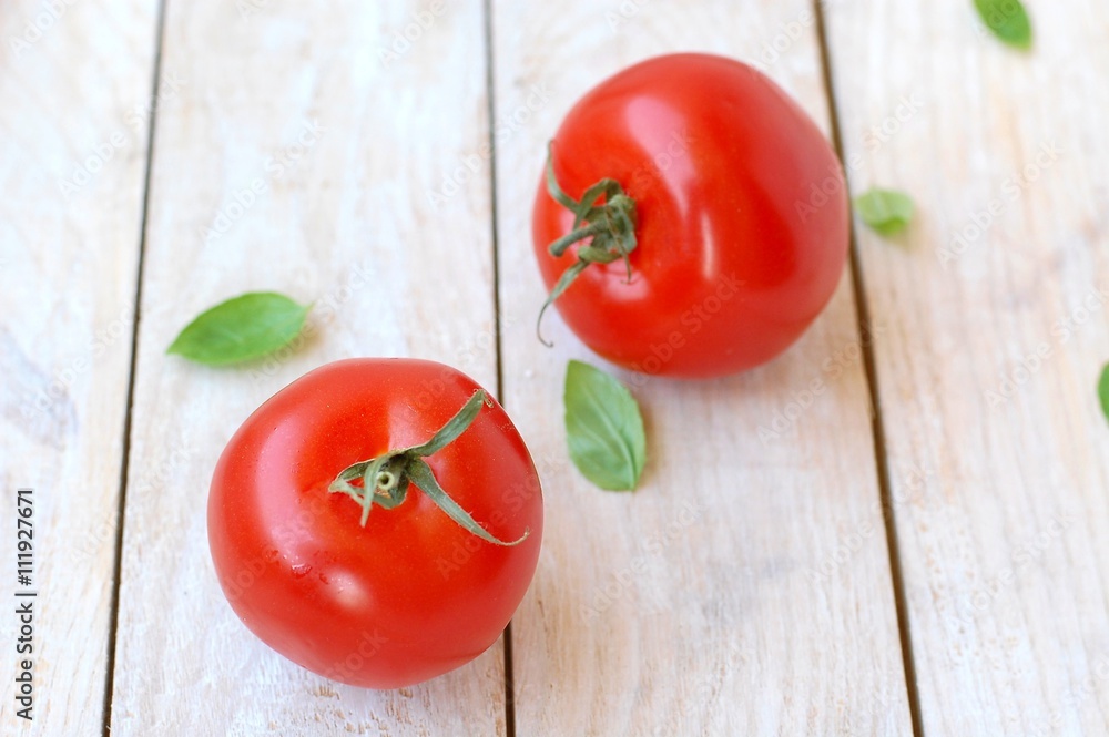 Tomatoes on the white background Tomatoes on the white background