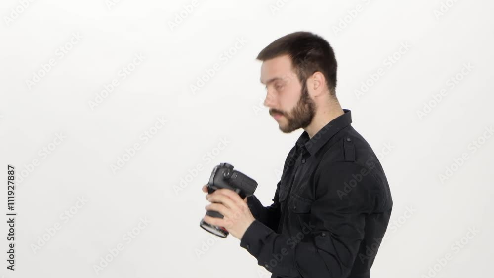 Photographer makes photo. White Photographer makes photo. White