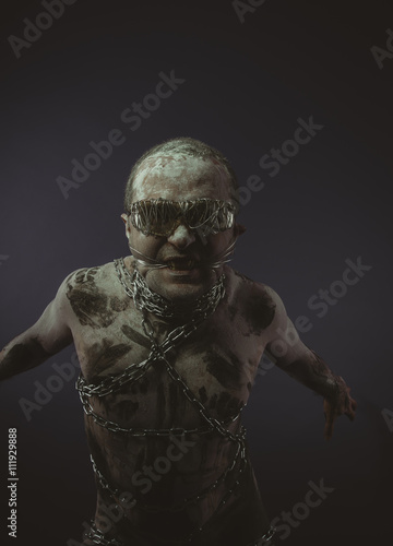 bondage, bdsm, man with chains by the body and wire glasses, ski