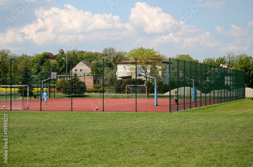 Obraz na płótnie Sports field in the countryside w salonie
