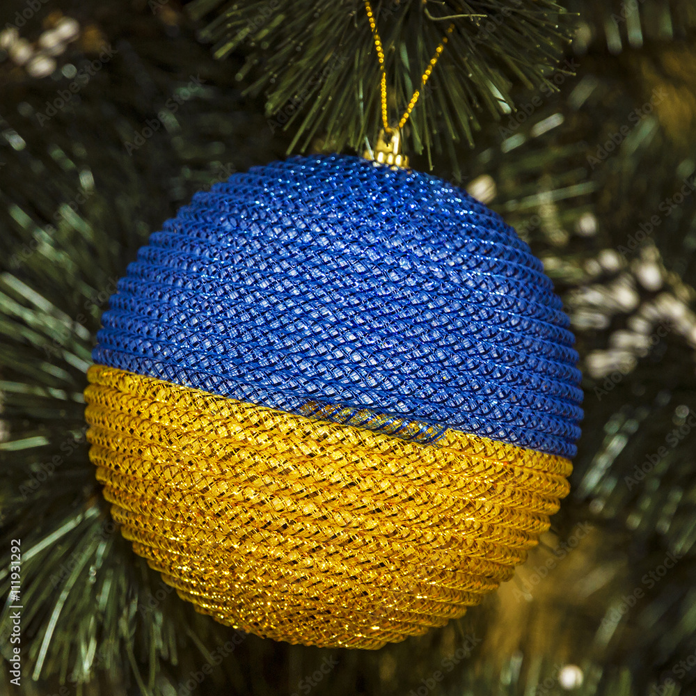 Christmas tree decoration, yellow and blue ball Stock Photo ...