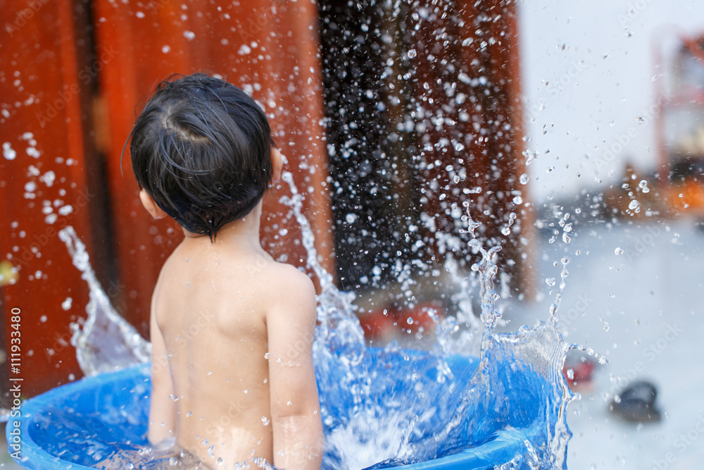 Children play in the water splashing Children play in the water splashing